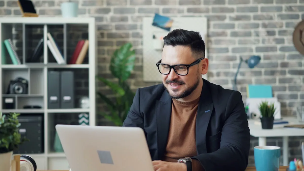 A person working at a laptop in an office